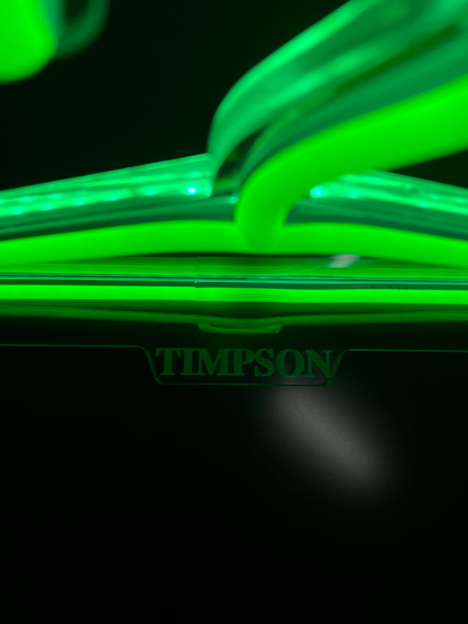Timpson green neon detail close-up