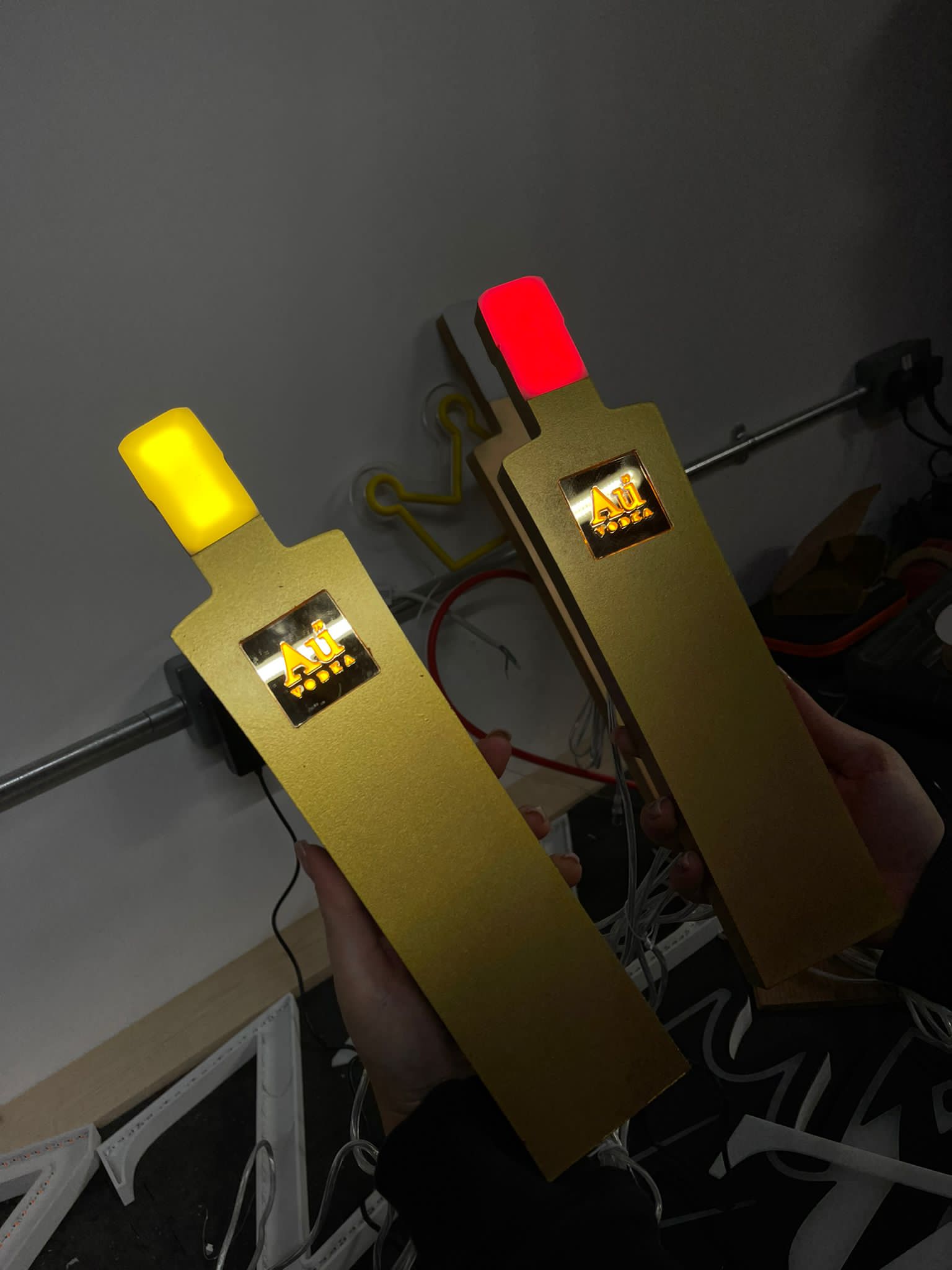 Au Vodka illuminated bottle props in workshop