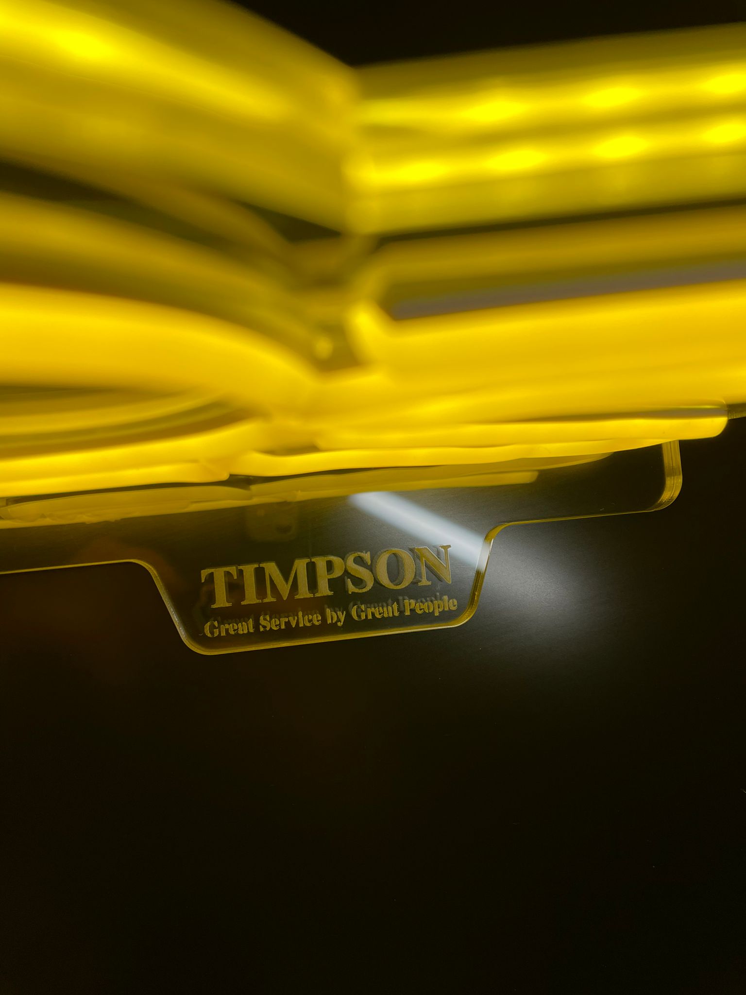 Timpson yellow neon detail