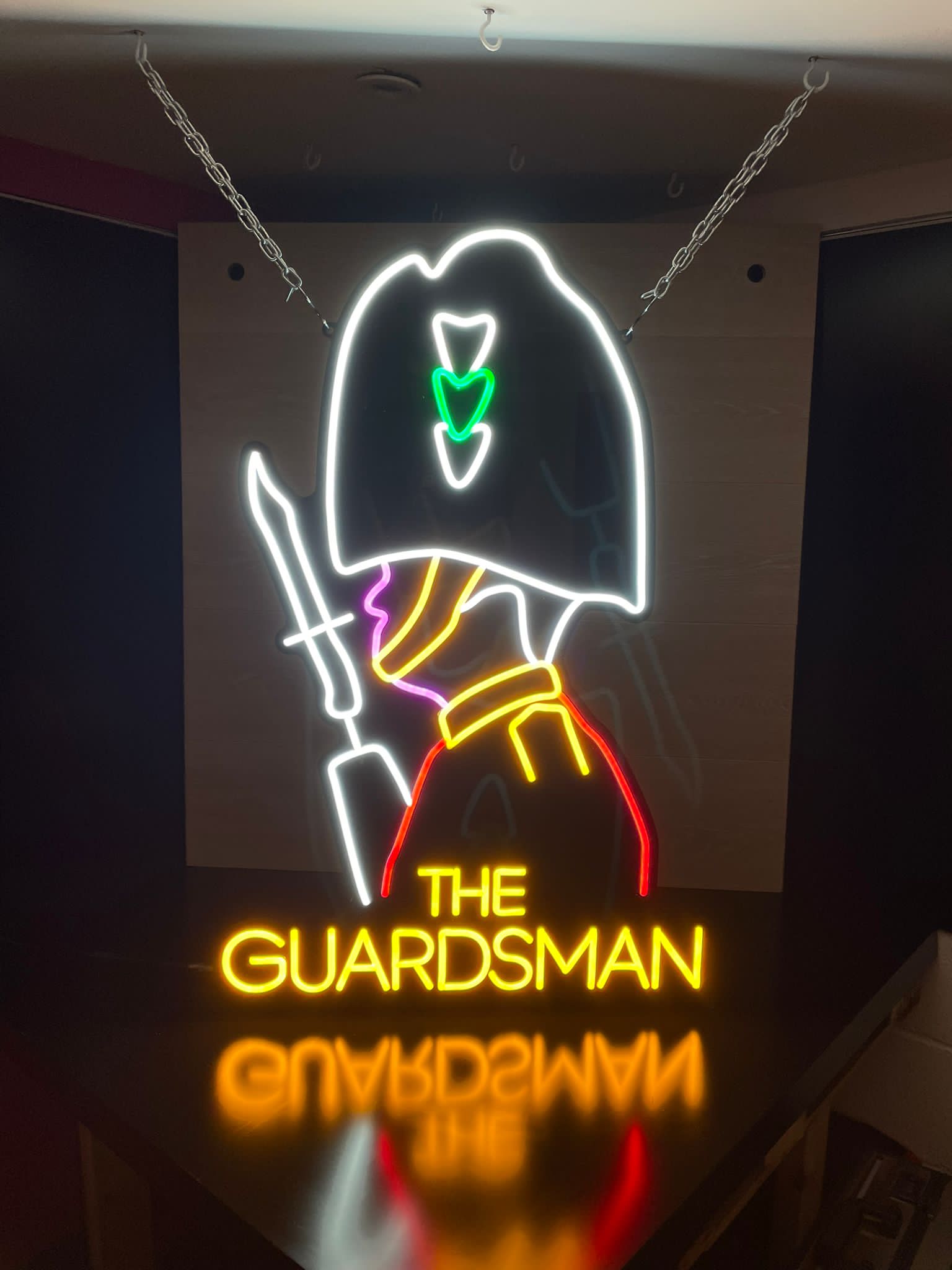 The Guardsman multi-colour neon hanging