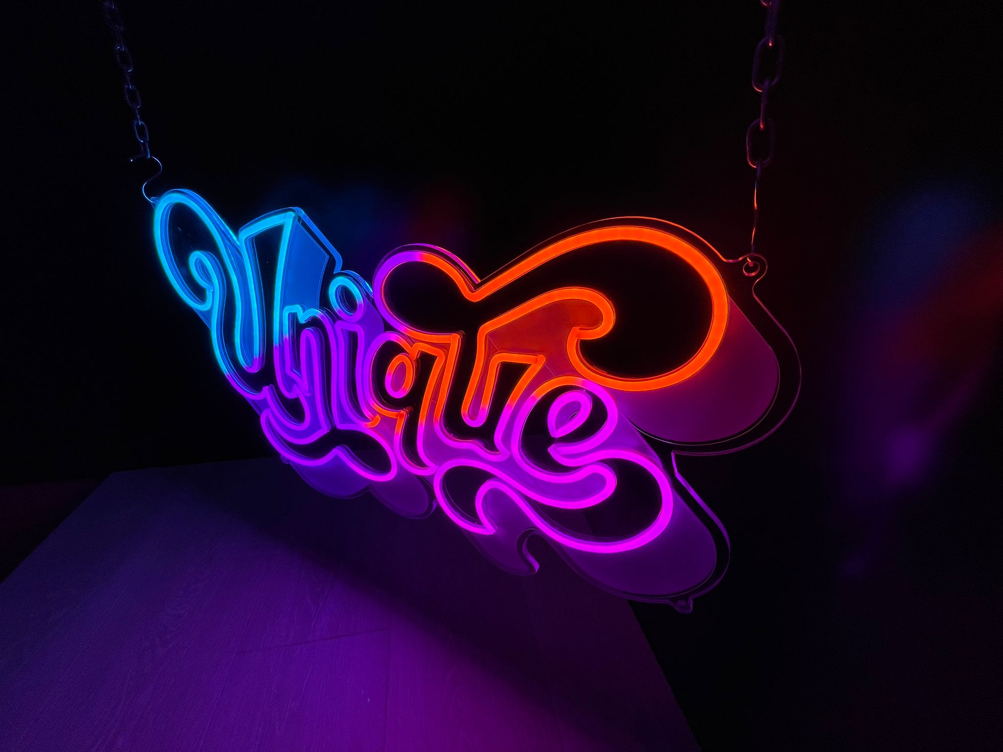 Uniqe colourful retro-style hanging neon