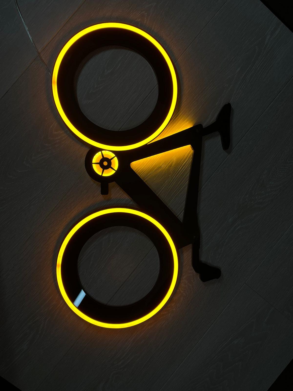 Halo-lit illuminated bicycle wall sign