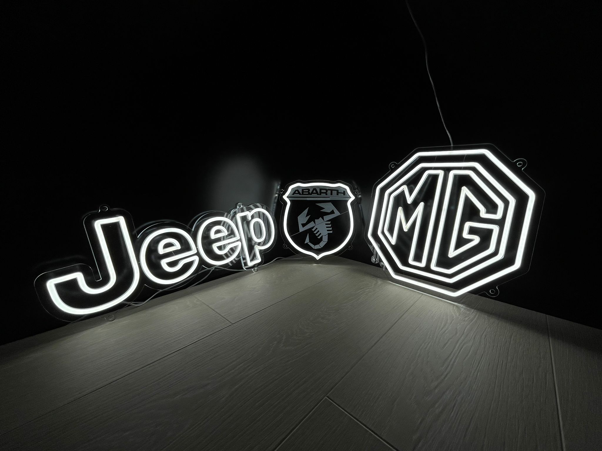 Jeep, Abarth and MG illuminated dealer logos