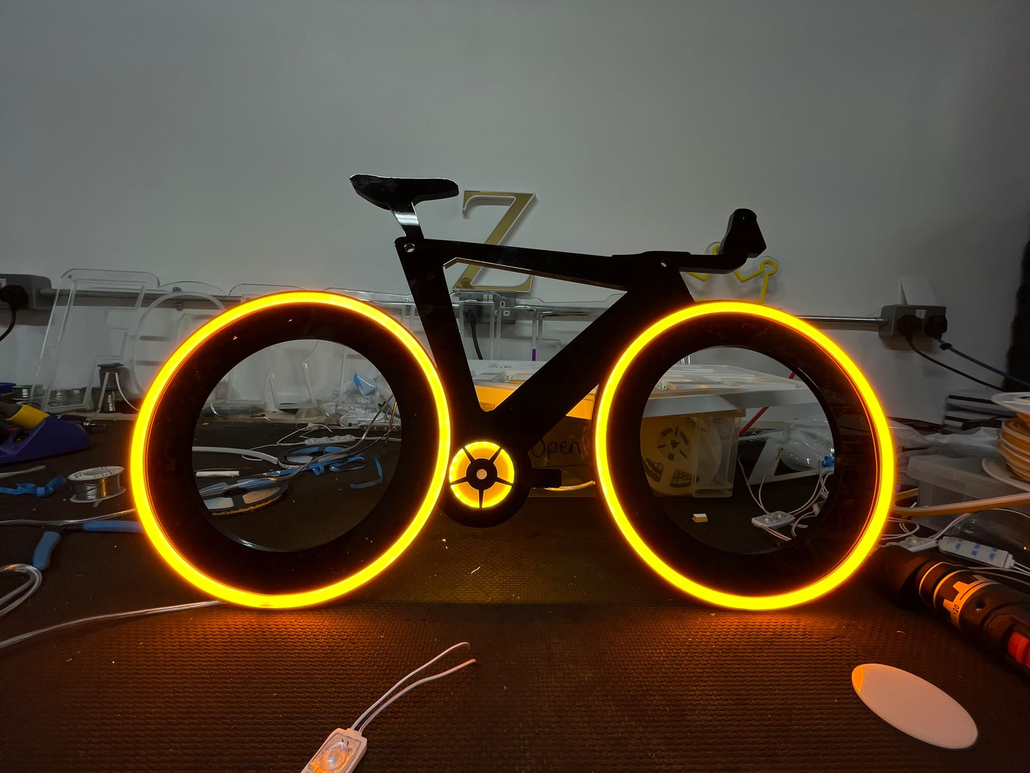 Full halo-lit illuminated bicycle wall sign
