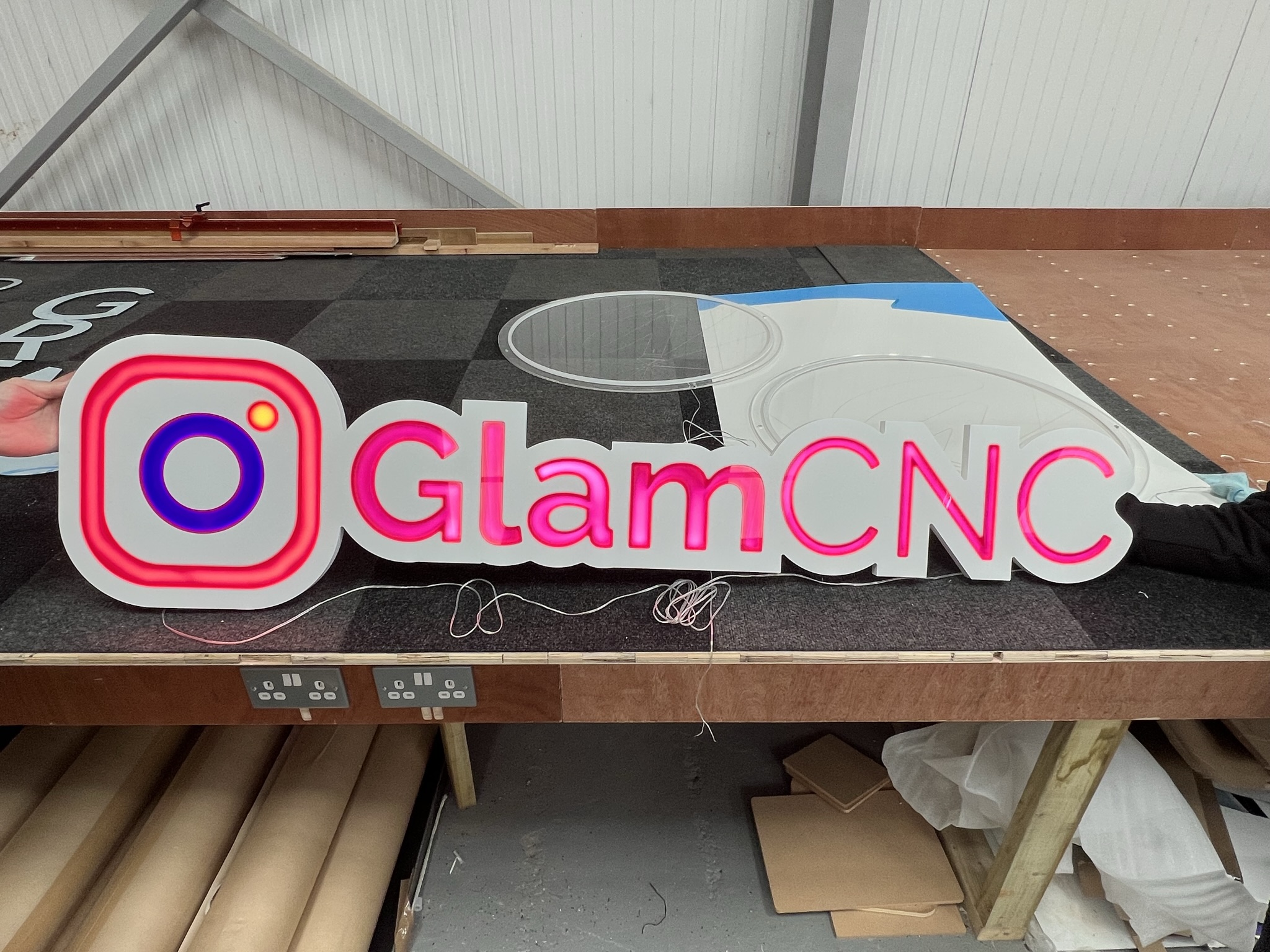 GlamCNC illuminated logo sign in fabrication