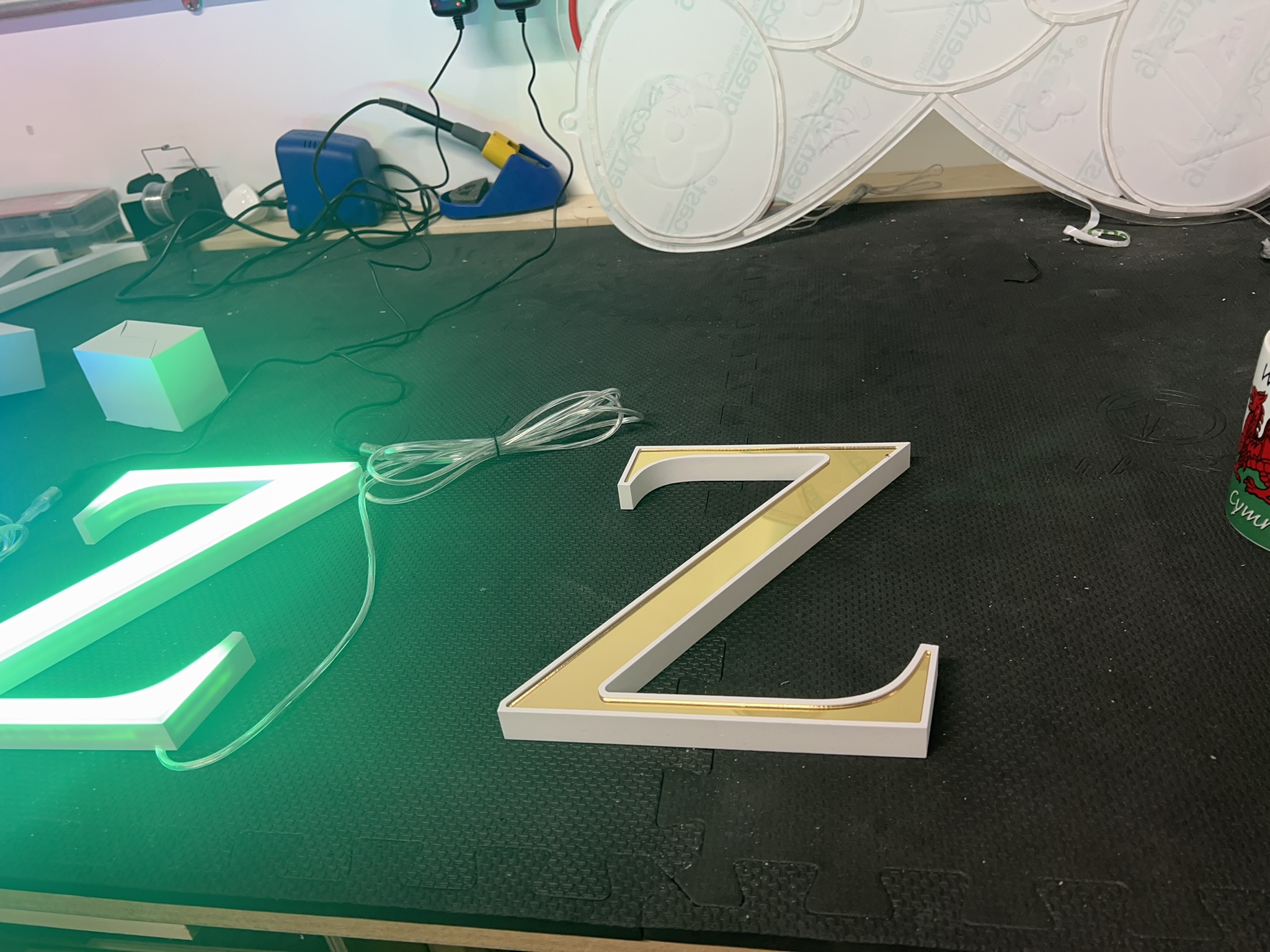 Built-up Z letter with gold face in workshop
