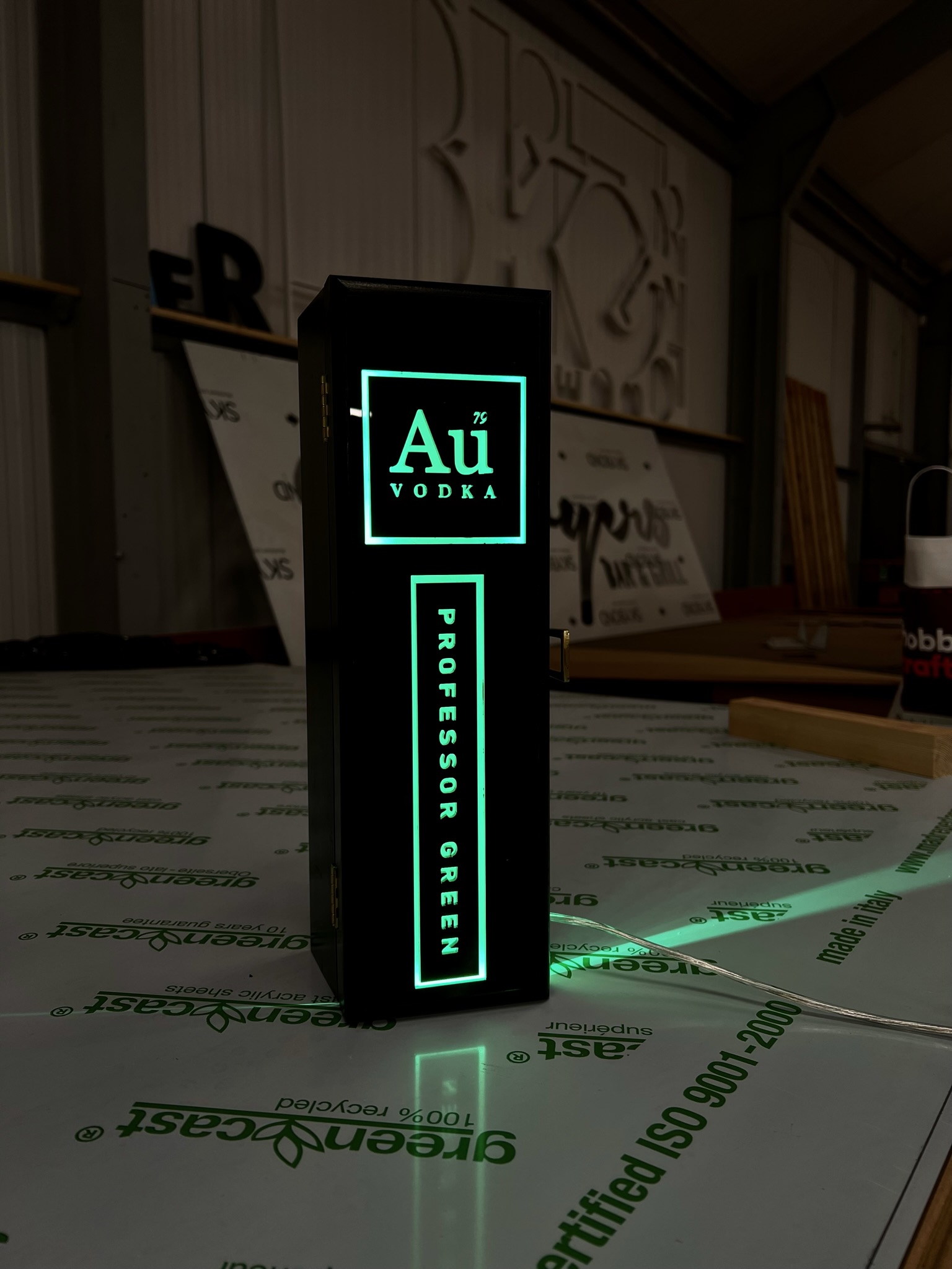 Au Vodka Professor Green illuminated prop on workshop bench