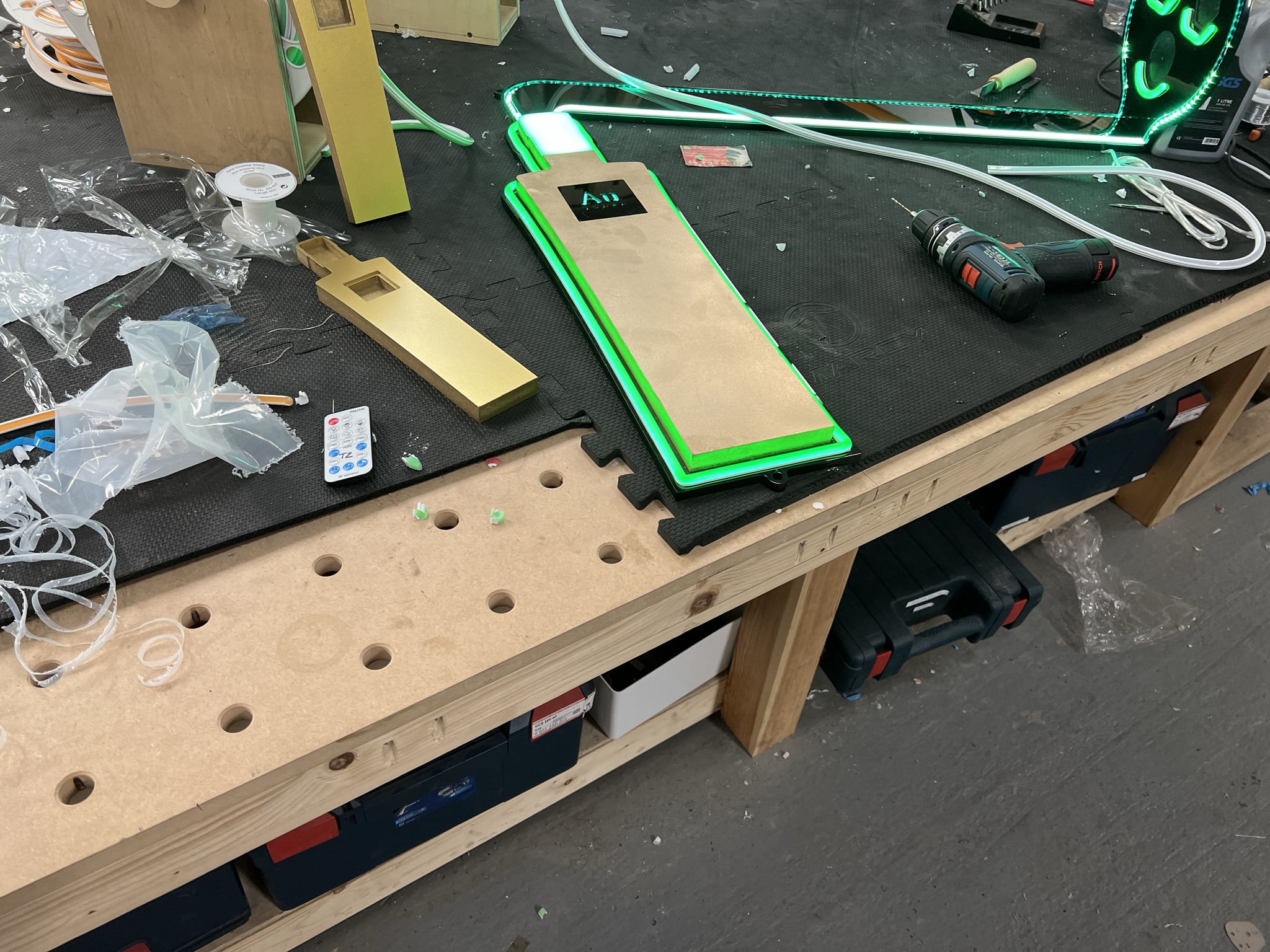 Au Vodka illuminated prop assembly in workshop