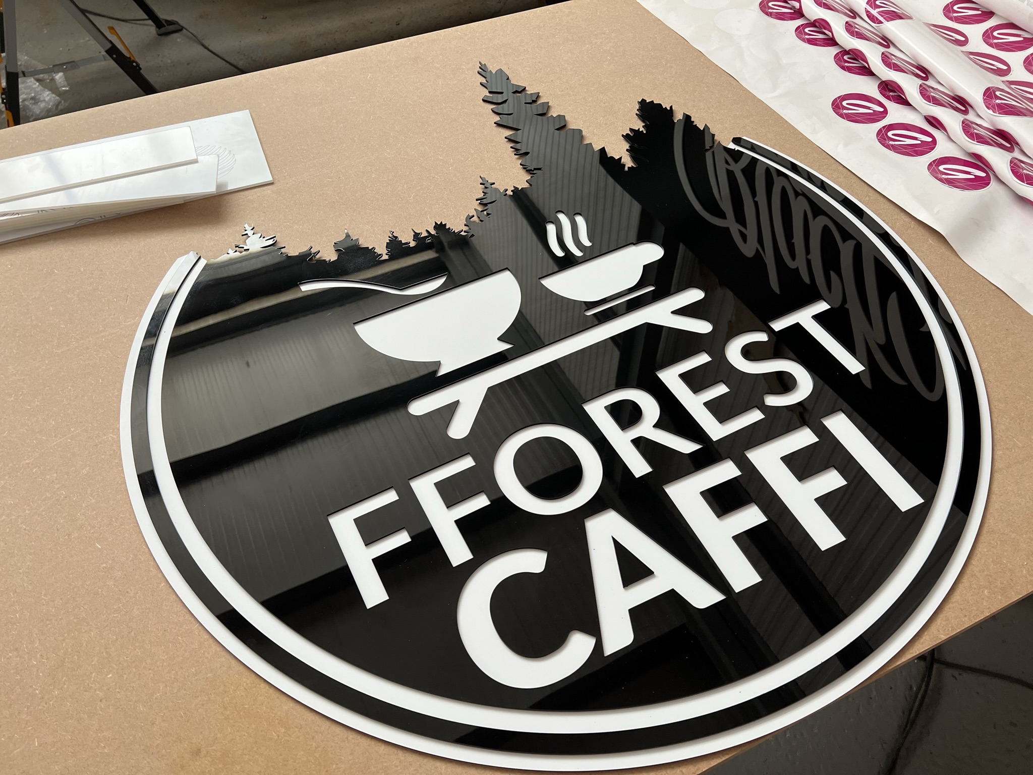 Fforest Caffi sign close-up on workshop bench
